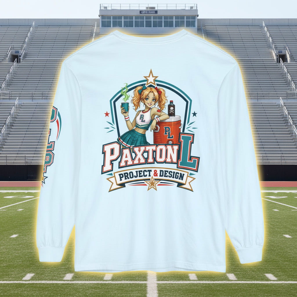 A light blue long-sleeve t-shirt shown from the back, featuring a large graphic print of a zombie cheerleader-style pin-up girl leaning on water cooler with the text 'PAXTON L PROJECT & DESIGN'.