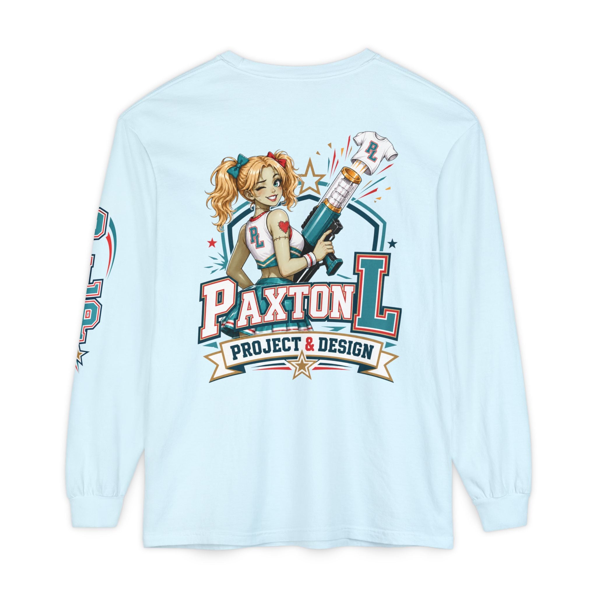 A light blue long-sleeve t-shirt shown from the back, featuring a large graphic print of a zombie cheerleader-style pin-up girl holding a shirt launcher with the text 'PAXTON L PROJECT & DESIGN'.